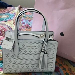 Kate Spade white pocketbook never used.